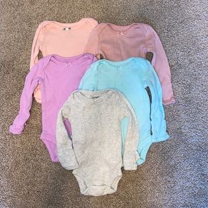 Bundle of (5) long sleeve NB Carters baby girl onesies